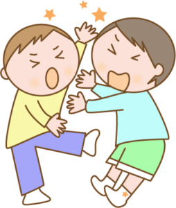 喧嘩をする小学生の男の子