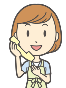 電話をする主婦